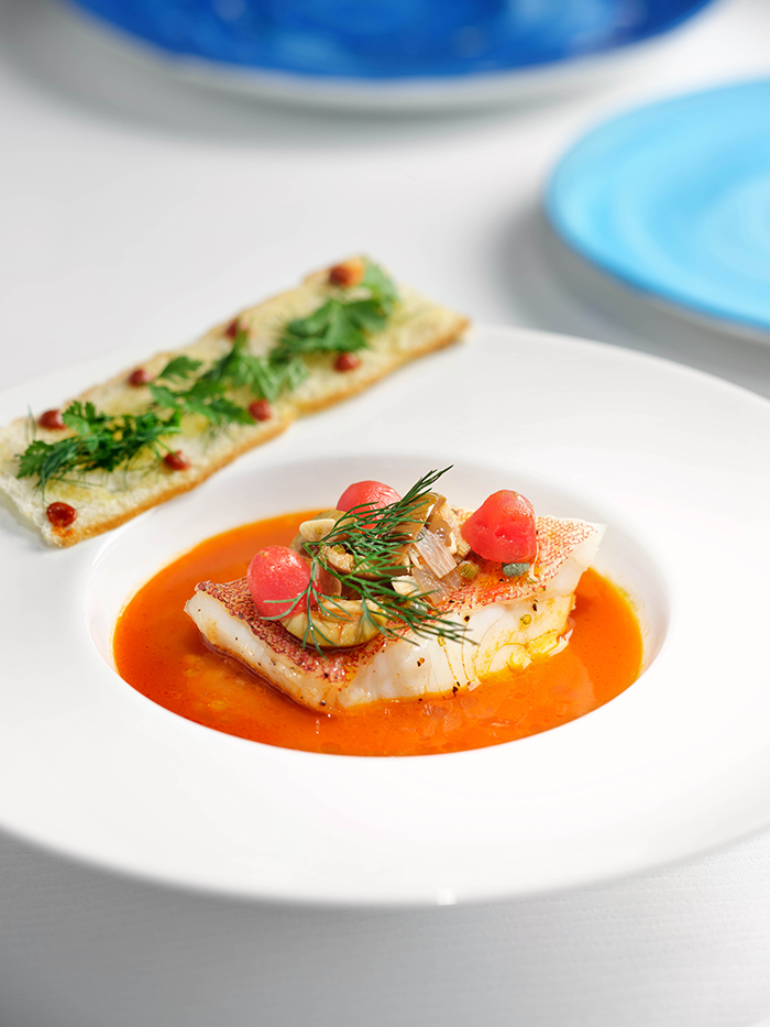 Red star grouper in matalotta fish soup with olives, capers and cherry tomatoes 紅石斑魚‧馬塔羅塔魚湯‧橄欖‧水瓜柳‧蕃茄